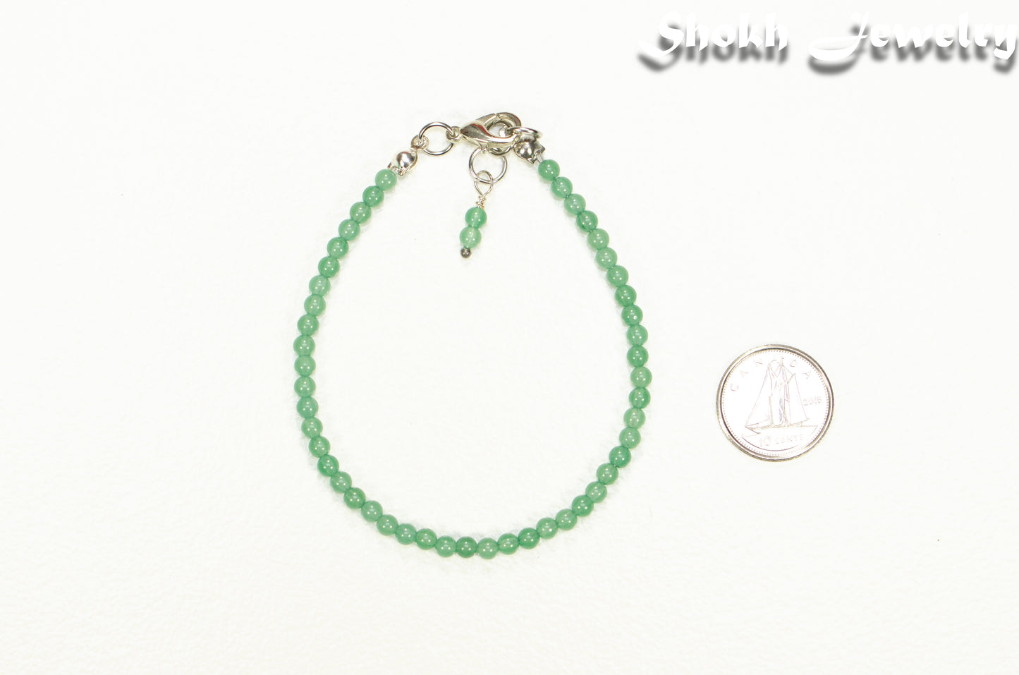 3mm Green Aventurine Anklet beside a dime.