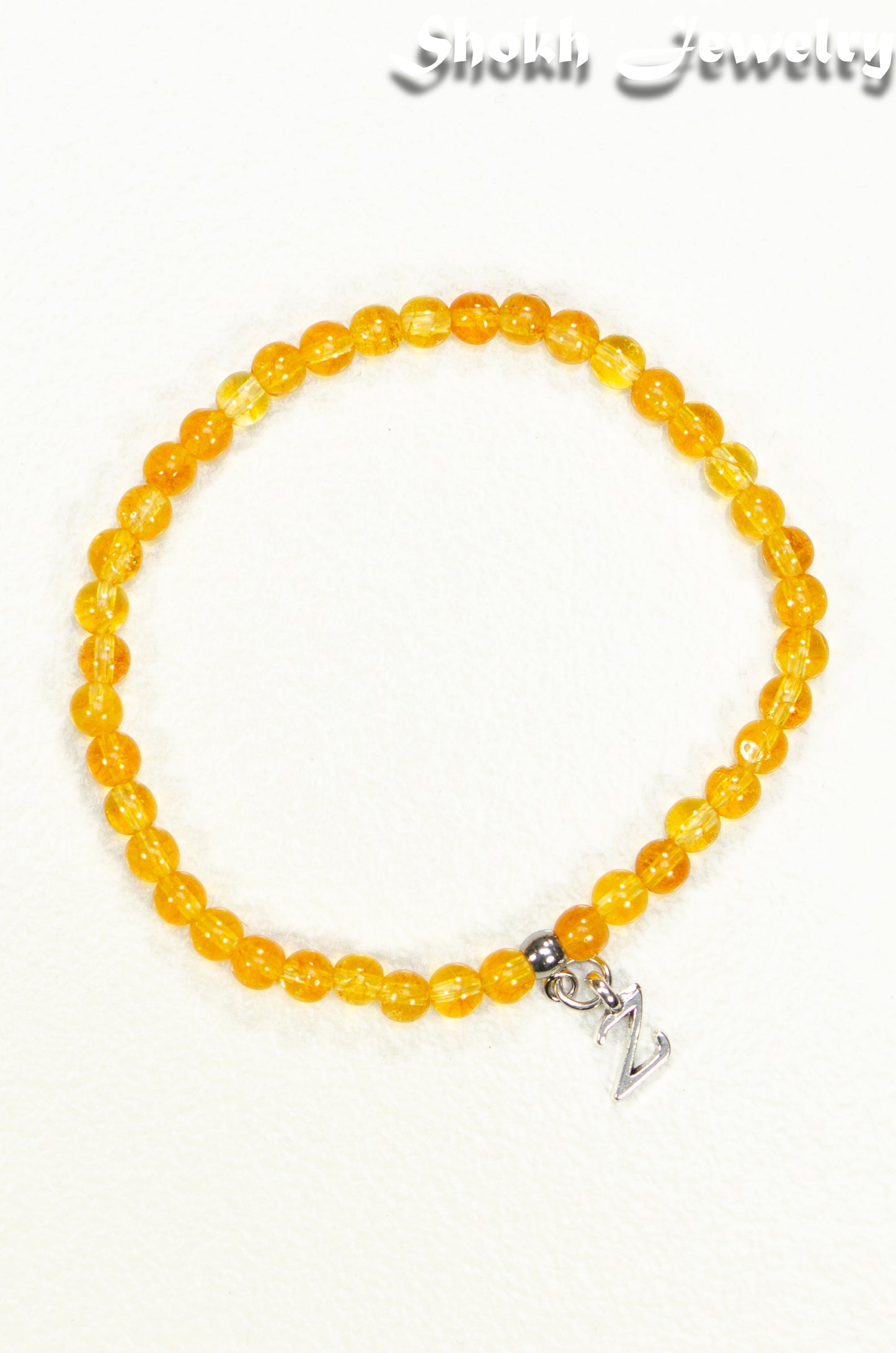 Top view of 4mm Citrine Bracelet with Initial.
