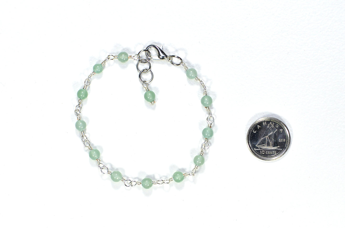 4mm Green Aventurine Link Anklet beside a dime.