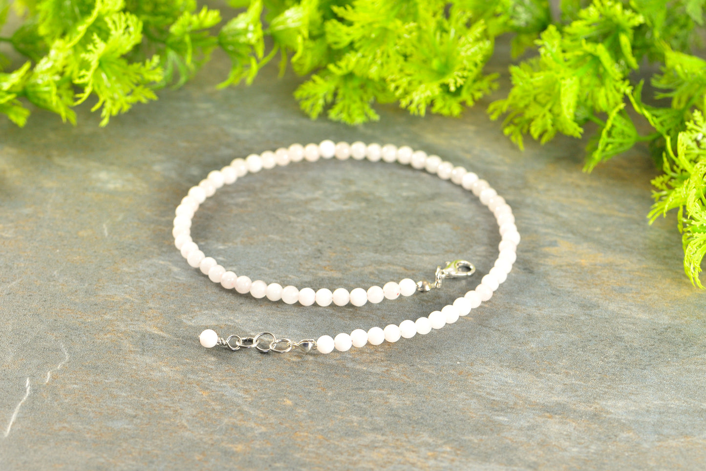 Close up of 4mm Rose Quartz Crystal Choker Necklace.