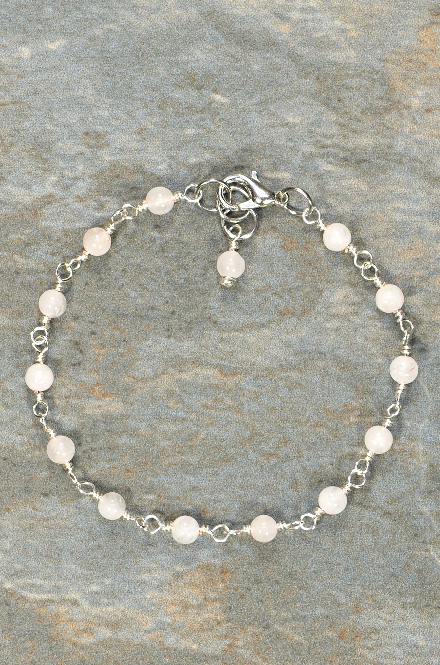 Top view of 4mm Rose Quartz Link Bracelet.