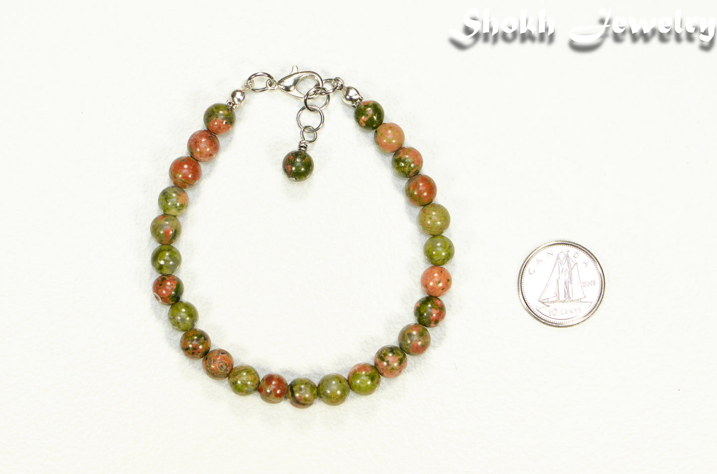 6mm Unakite Jasper Beaded Anklet beside a dime.