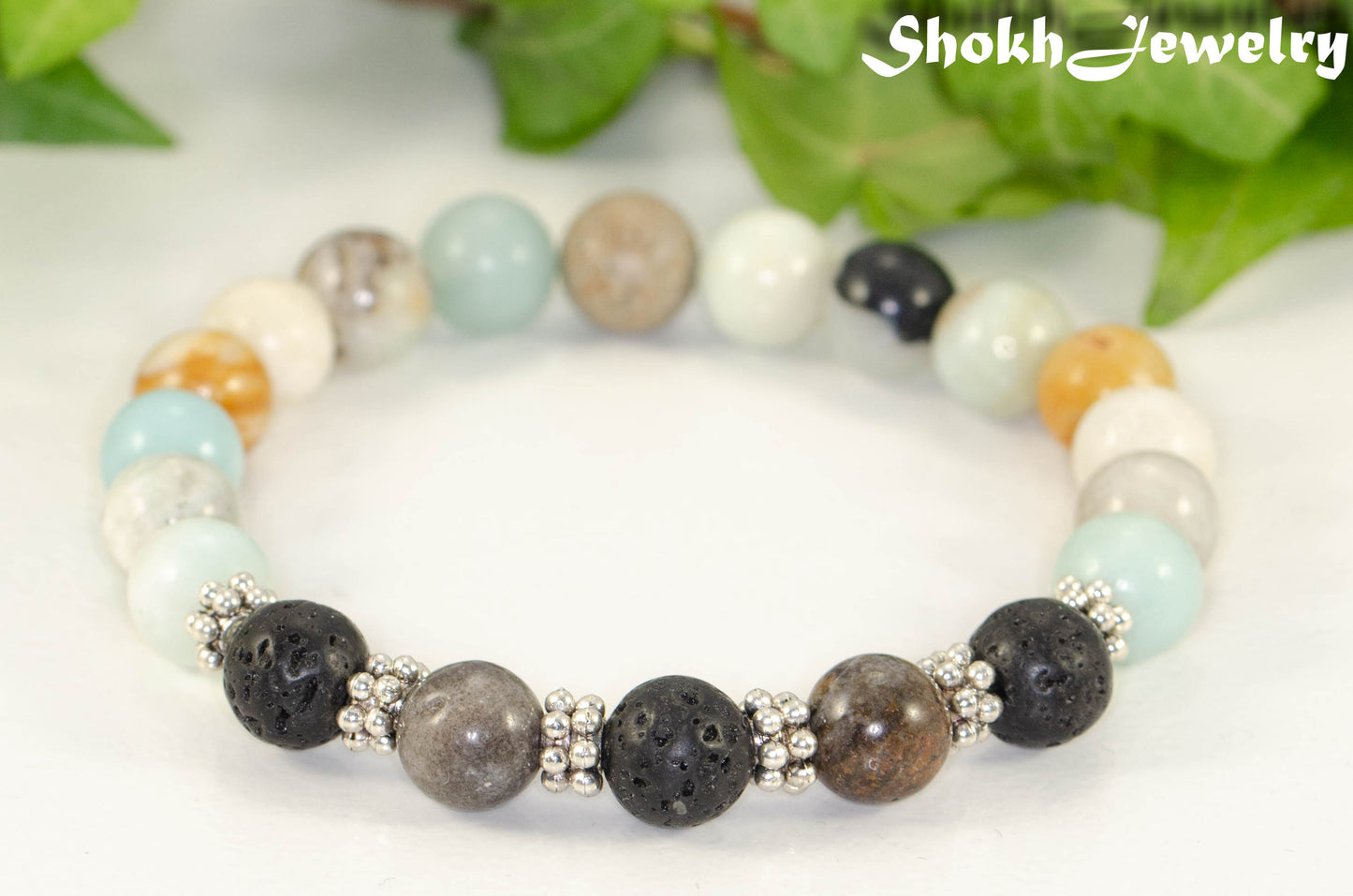 Close up of 8mm Amazonite and Black Lava Stone Bracelet.