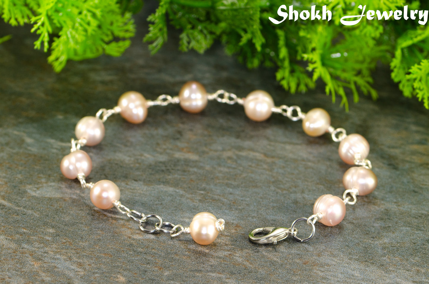 Close up of Lavender Freshwater Pearls Link Chain Bracelet.