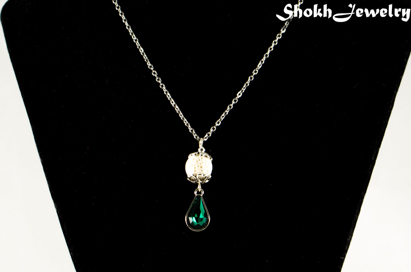 Lava Rock and Teardrop May Birthstone Choker Necklace displayed on a bust.
