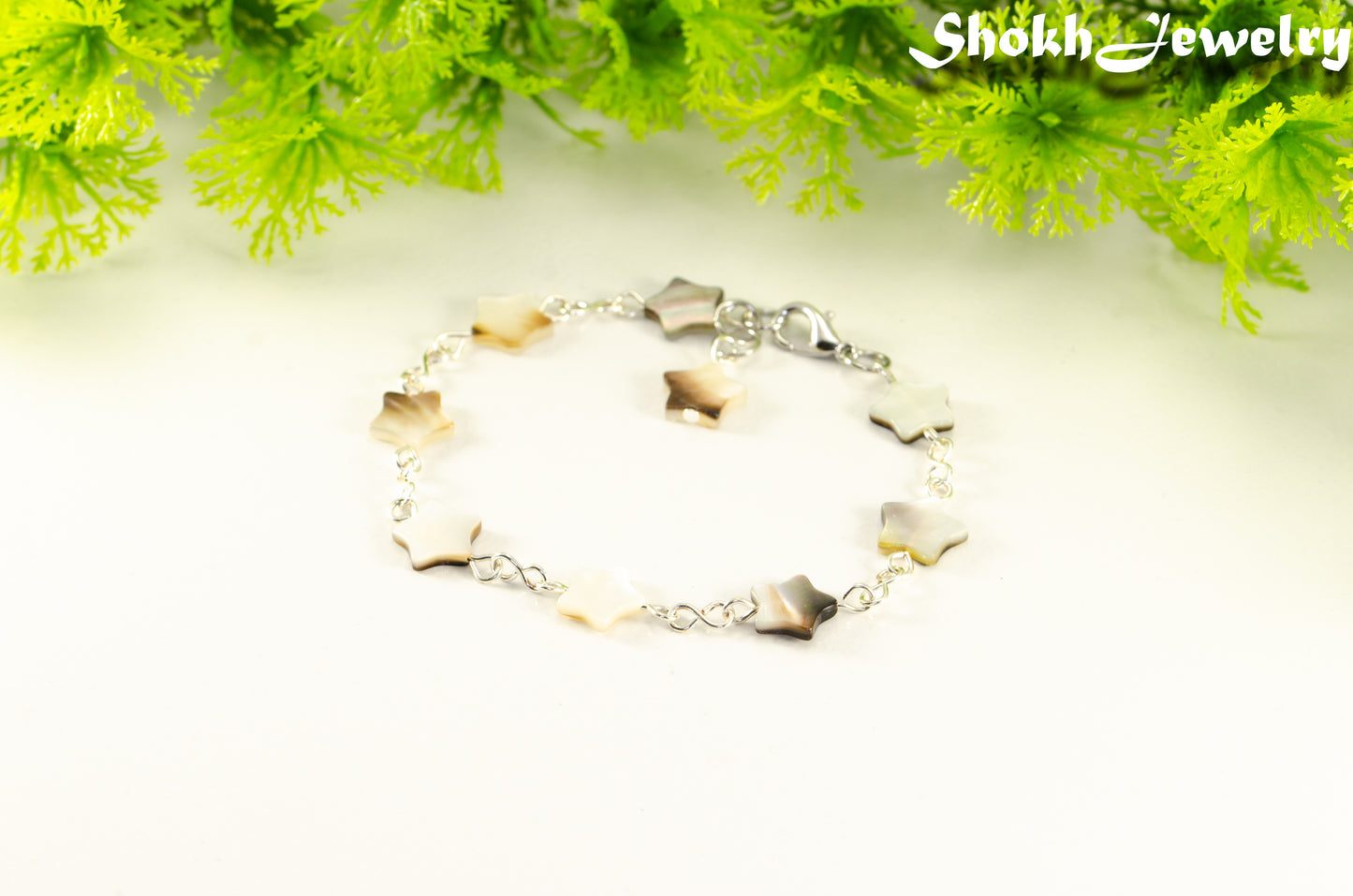Natural Gray Seashell Star Link Bracelet with clasp.