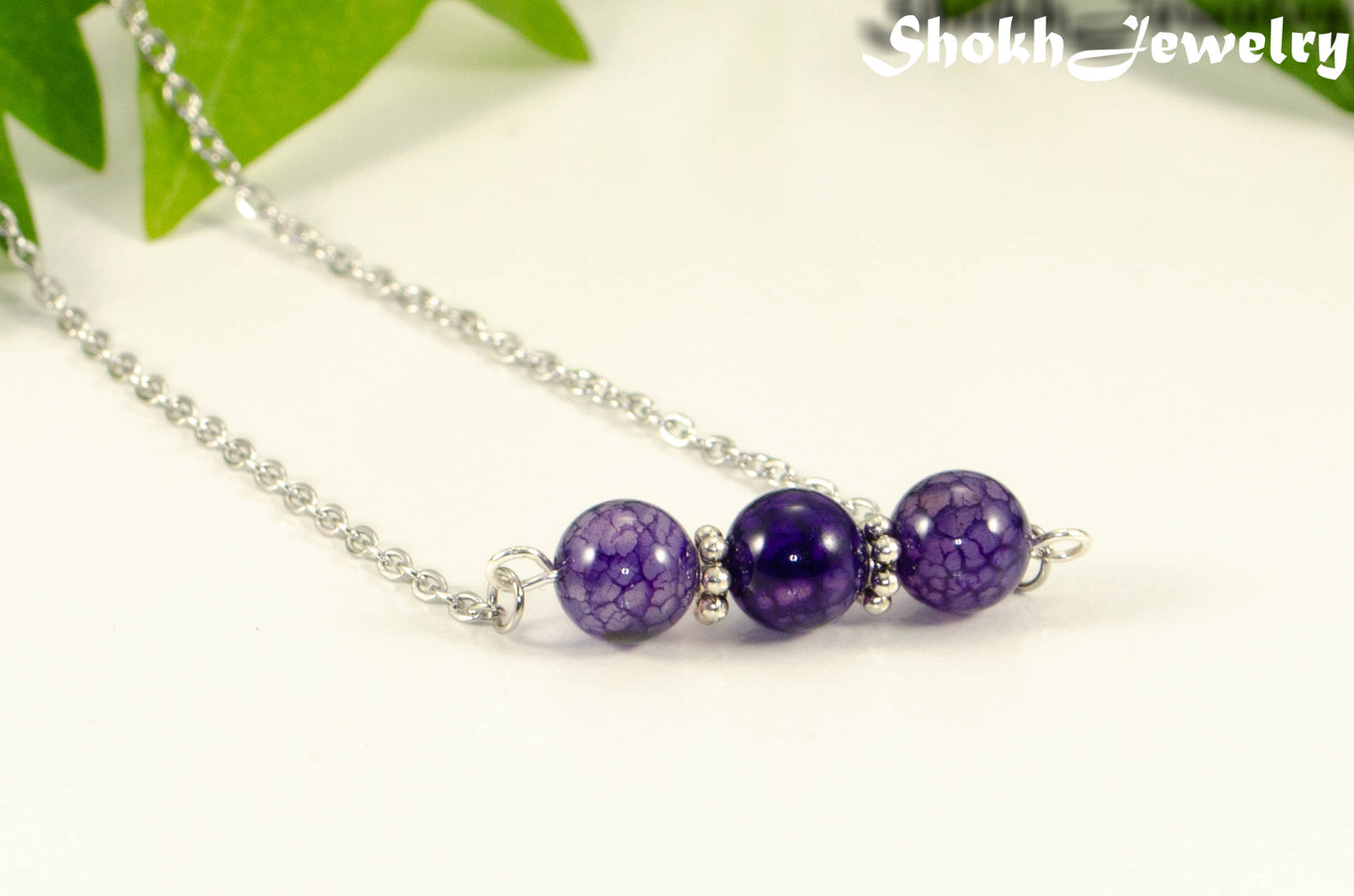 Close up of Purple Agate and Dainty Chain Choker Necklace.