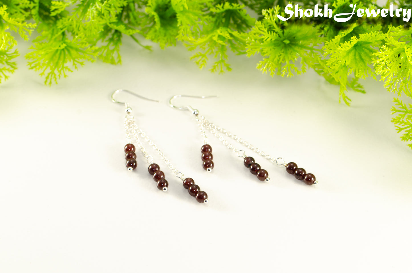 Silver Plated Chain and Garnet Crystal Earrings.