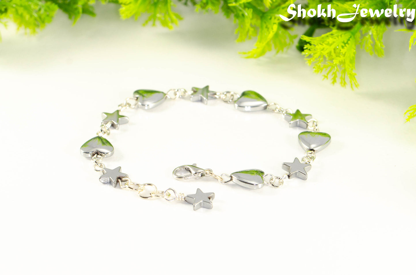 Close up of Handmade Hematite Heart and Star Link Bracelet.