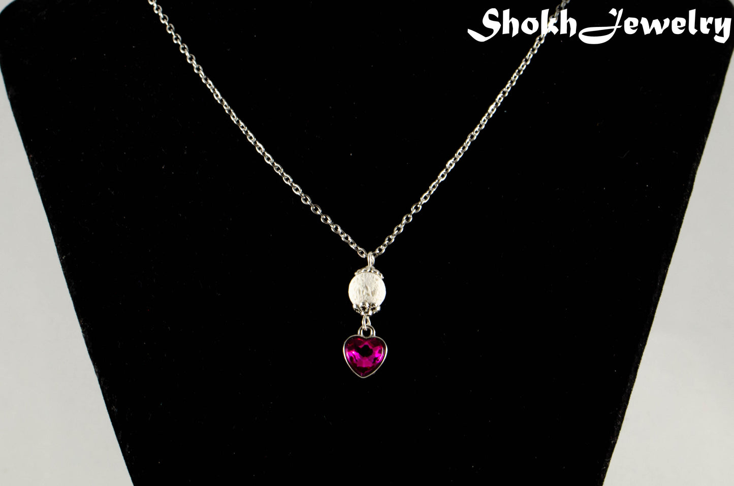 Lava Rock and Heart Shaped October Birthstone Choker Necklace displayed on a bust.