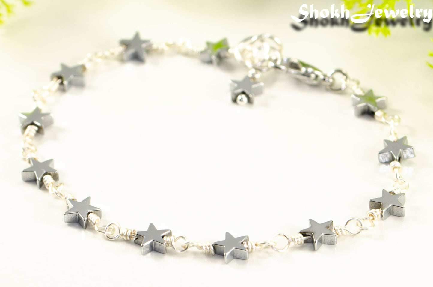 Close up of Small Hematite Star Link Anklet.