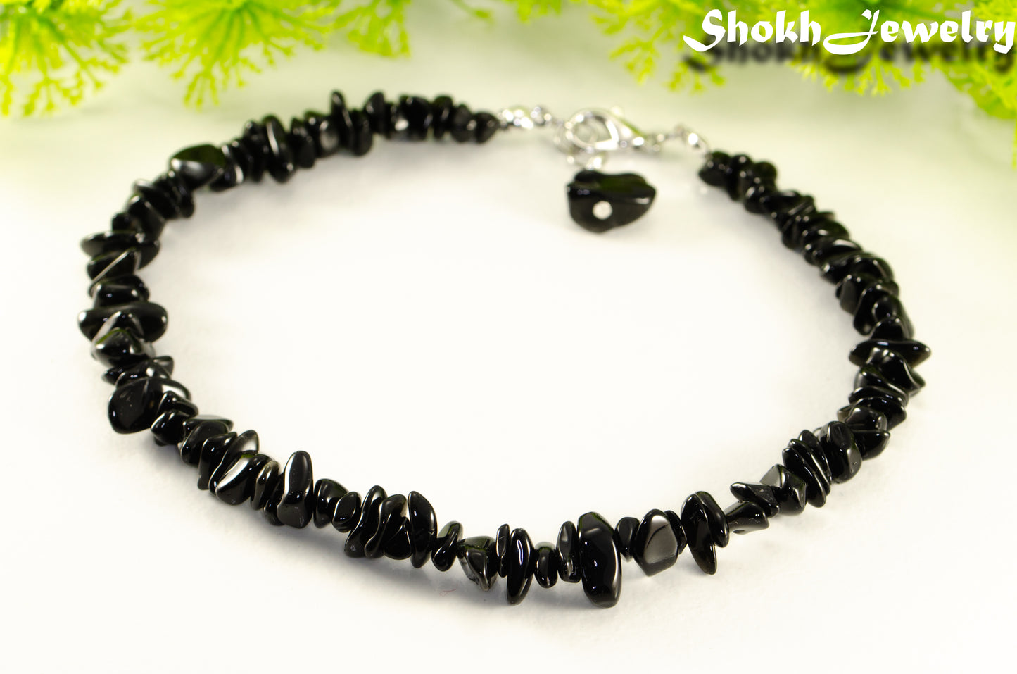 Close up of Natural Black Obsidian Crystal Chip Anklet.