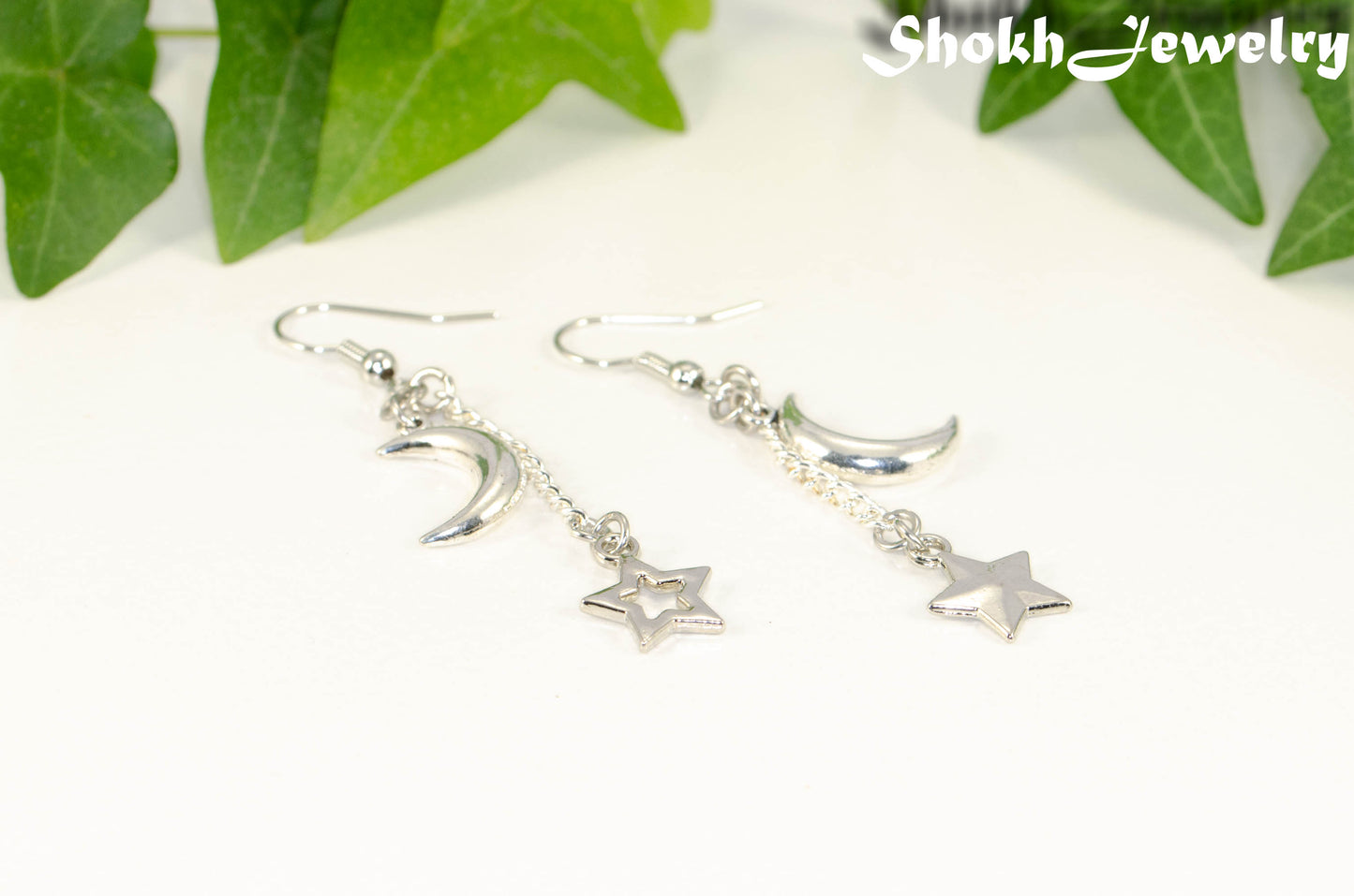 Crescent Moon and Mismatched Star Earrings.