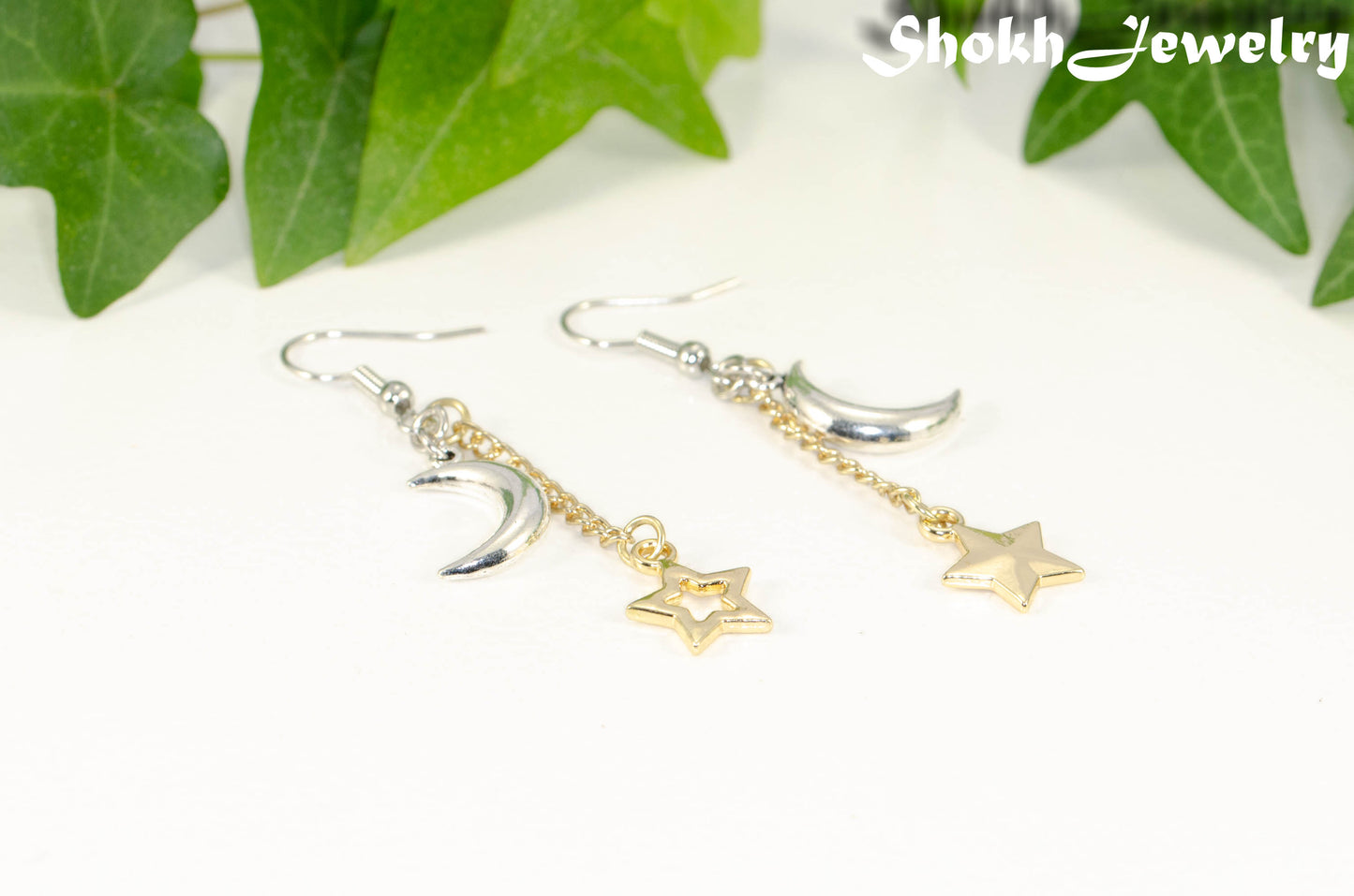 Crescent Moon and Mismatched Gold Star Earrings.