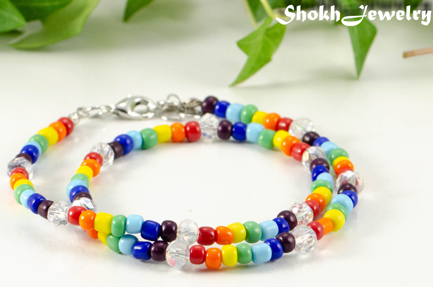 Close up of Clear Glass Crystal and Rainbow Seed Bead Anklet.