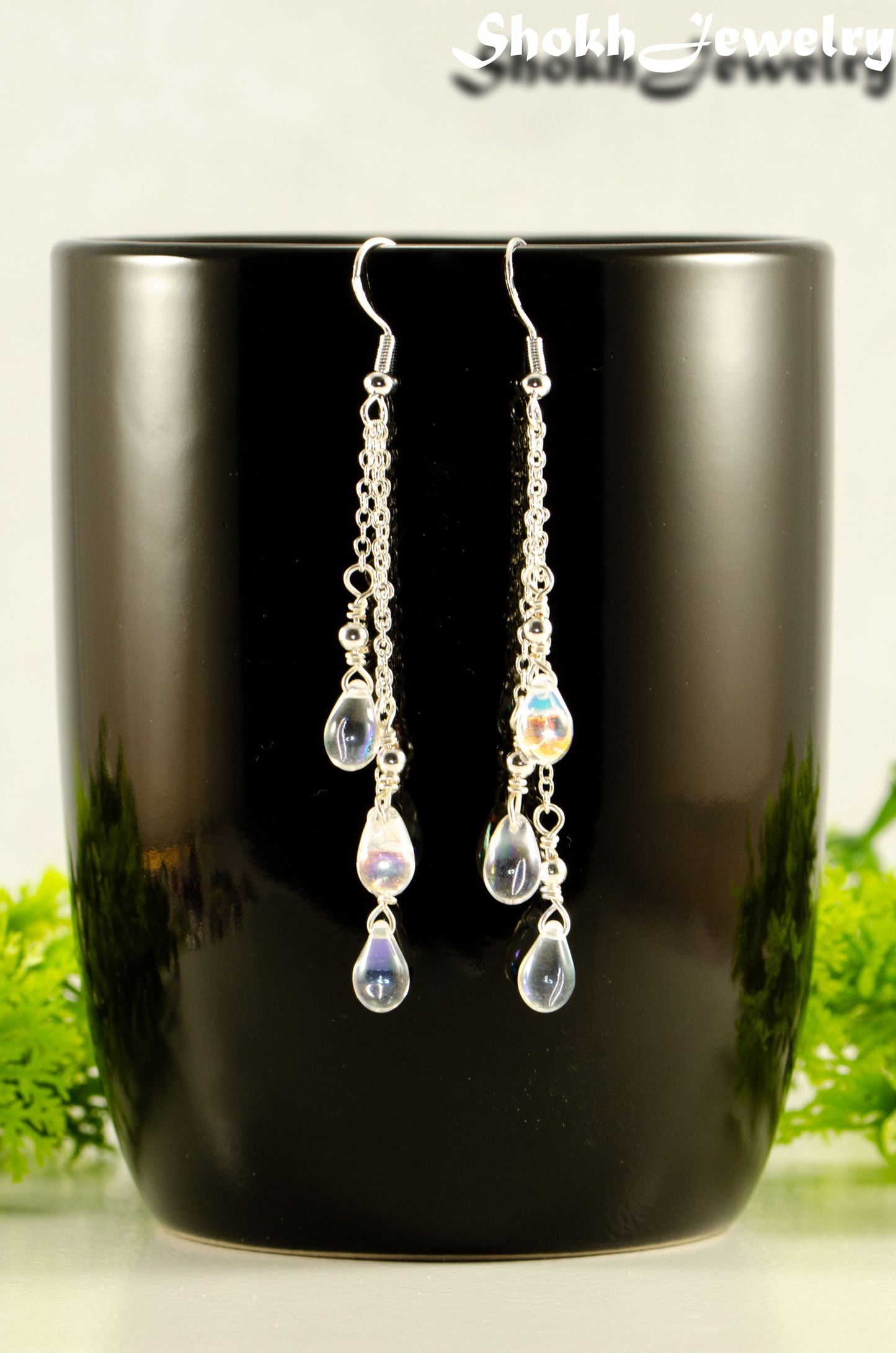 Close up of Long Silver Plated Chain and Czech Teardrop Crystal Earrings.