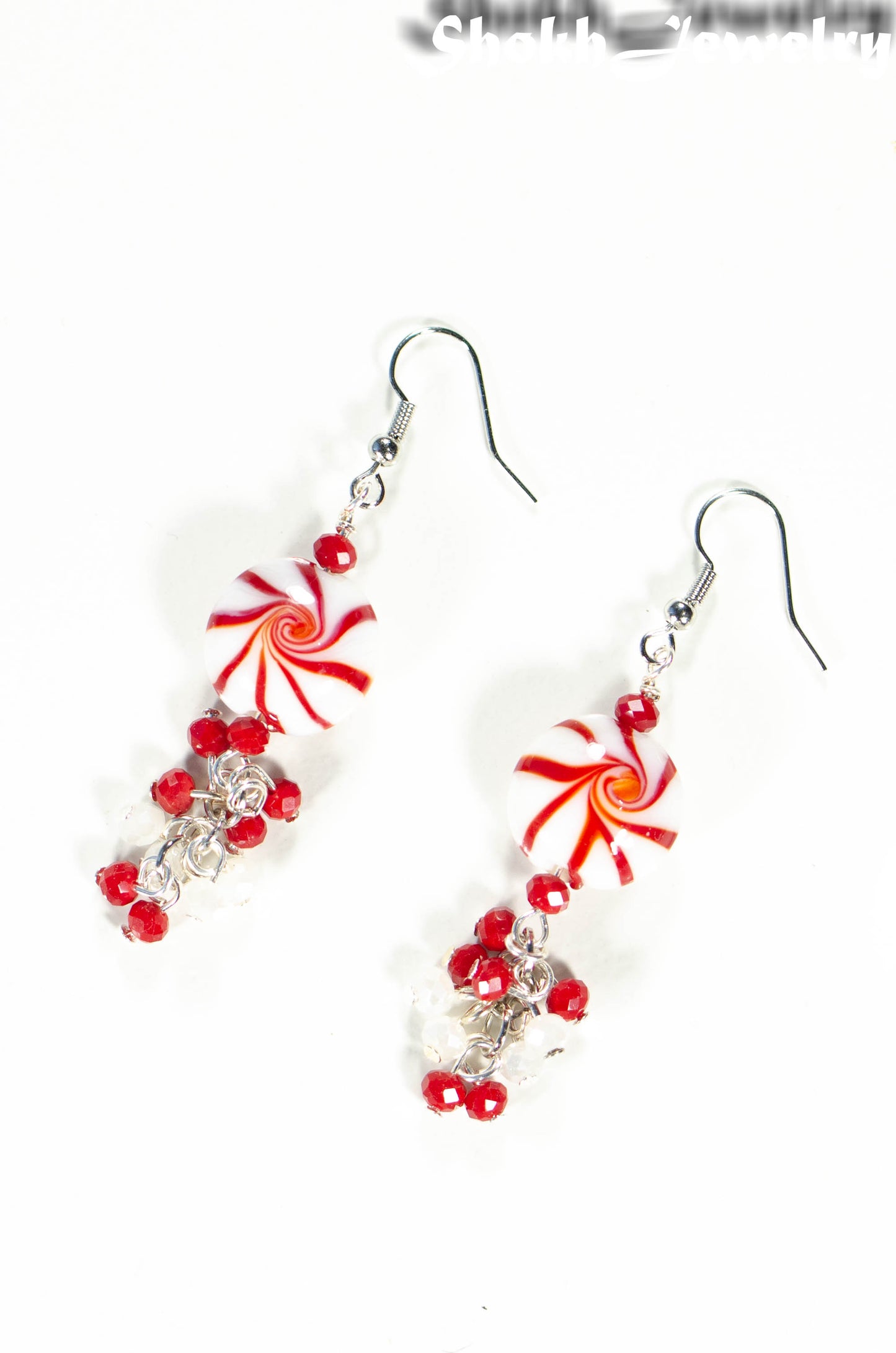 Top view of Statement Christmas Peppermint Glass Bead Earrings.
