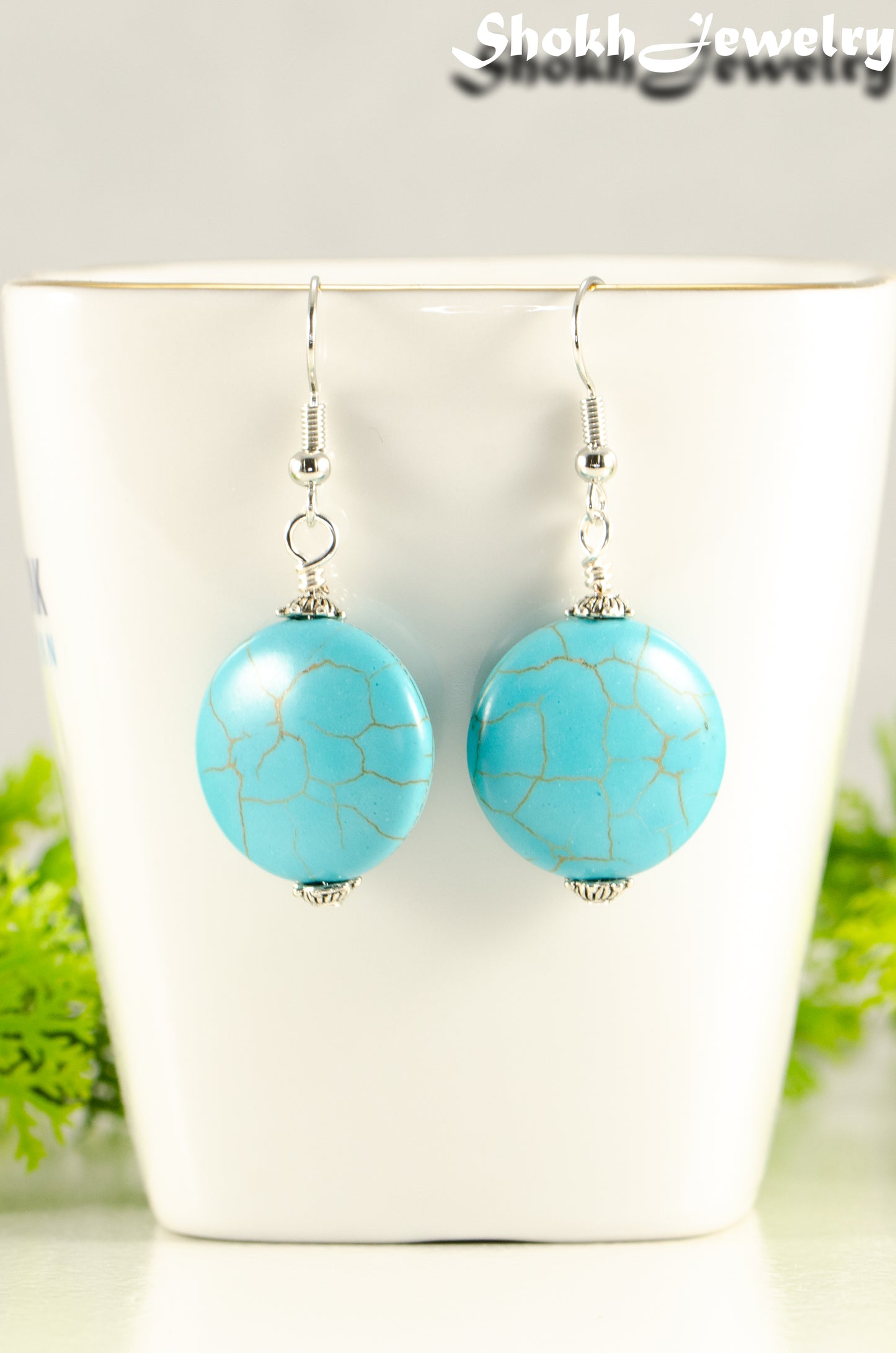 Close up of 20mm Turquoise Howlite Earrings.
