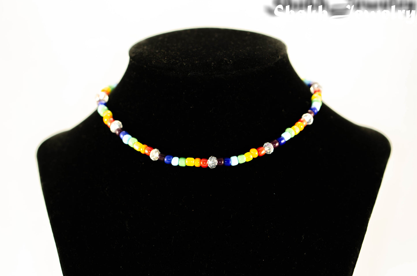 Clear Glass Crystal and Rainbow Seed Bead Choker Necklace displayed on a bust.