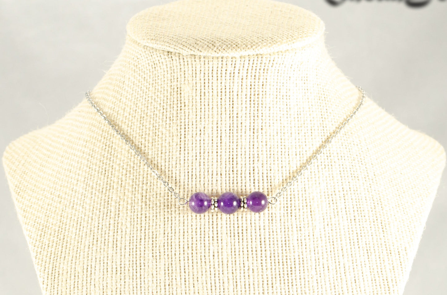 Amethyst and Dainty Chain Choker Necklace displayed on a bust.