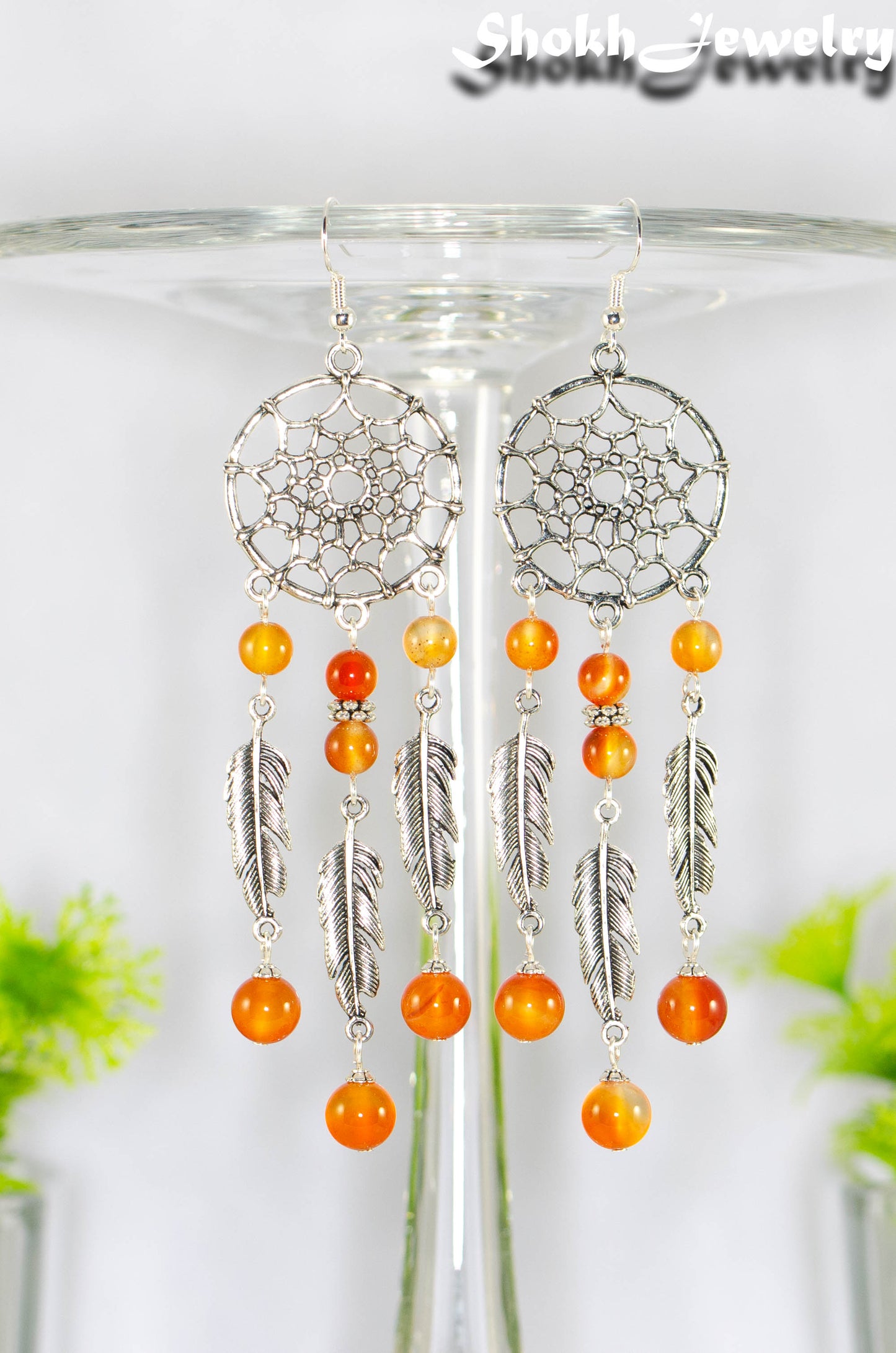 Close up of Extra Long Carnelian Dream Catcher Earrings.