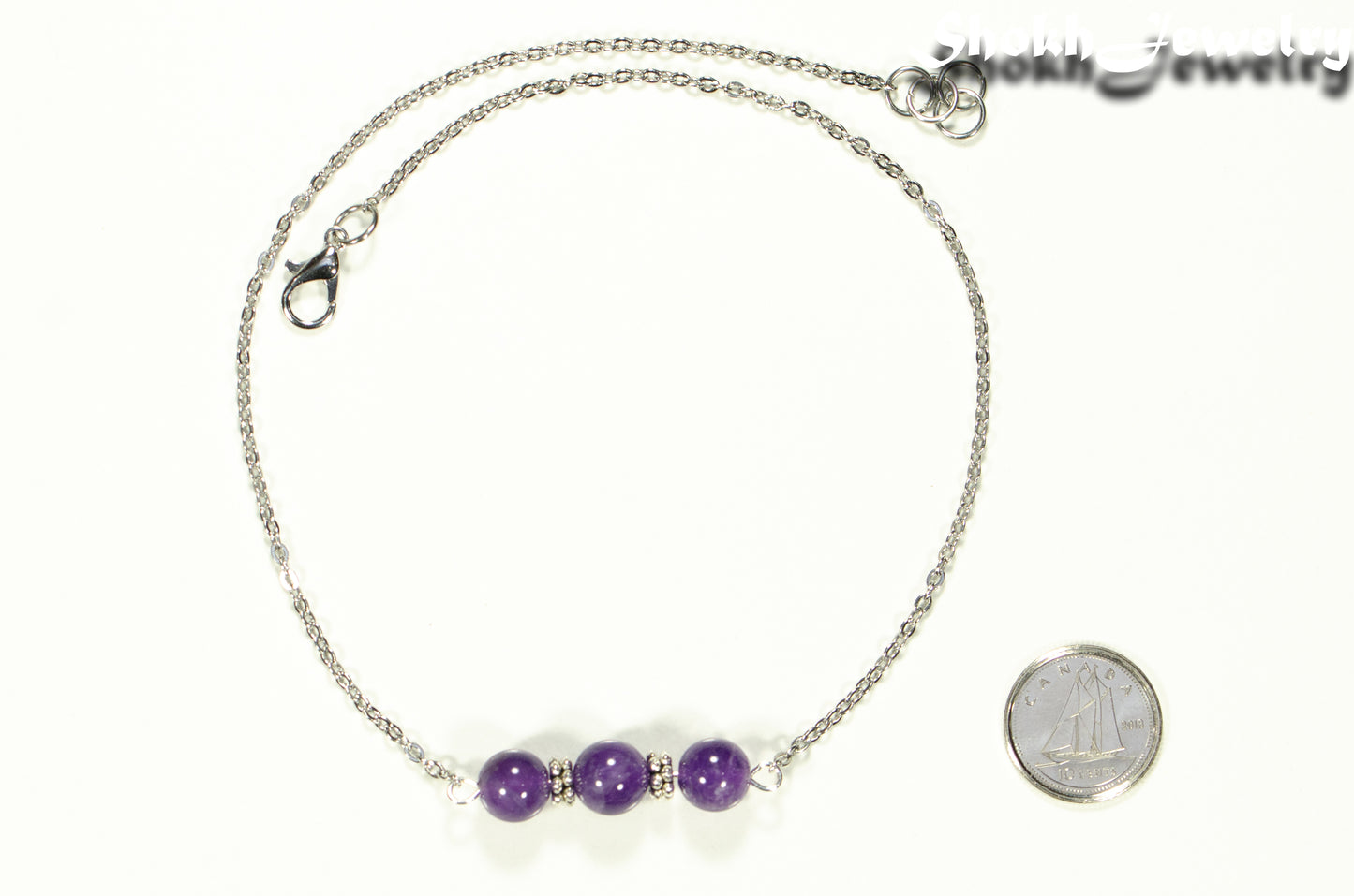 Amethyst and Dainty Chain Choker Necklace beside a dime.