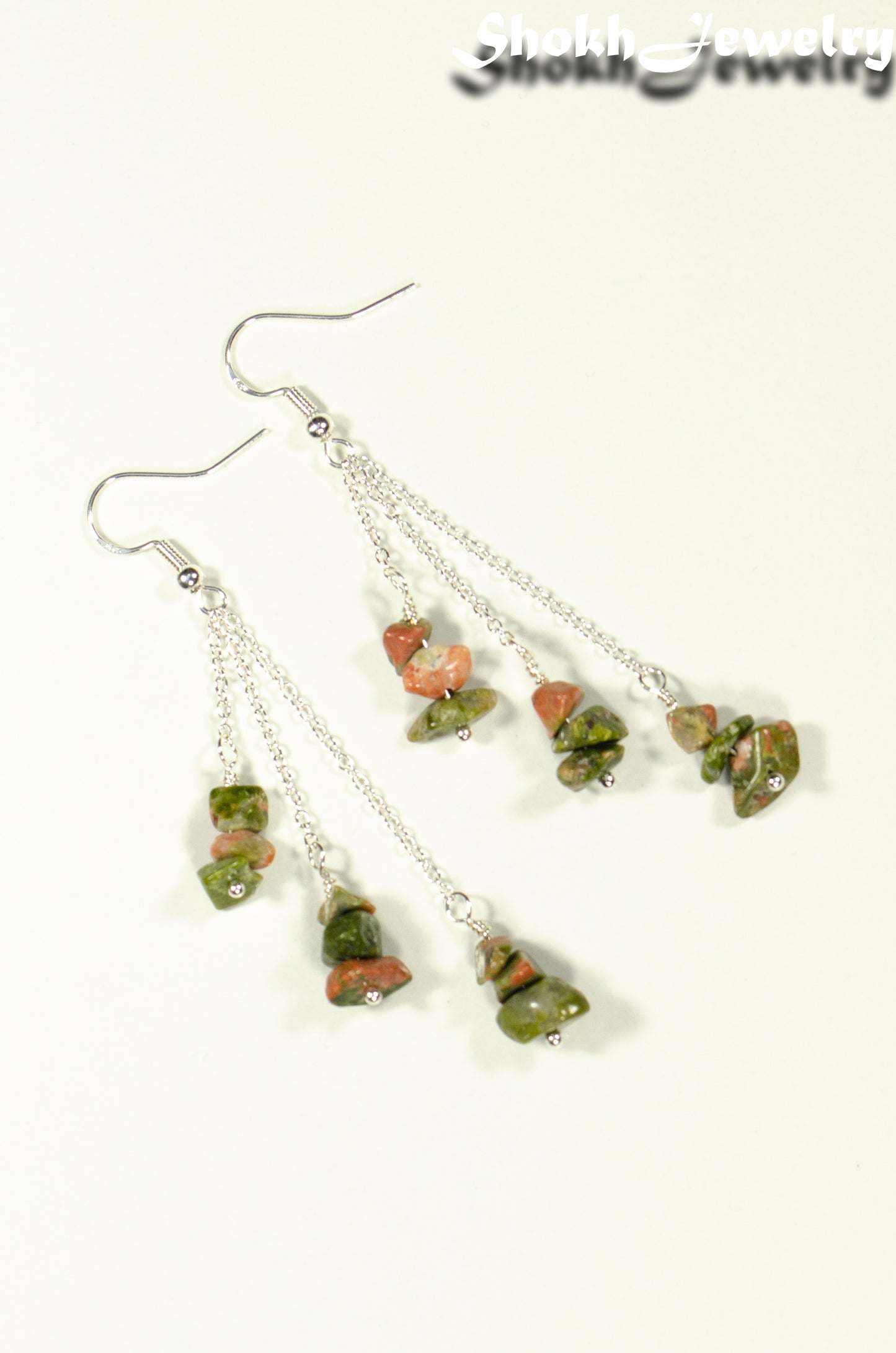 Top view of Long Silver Plated Chain and Unakite Crystal Chip Earrings.