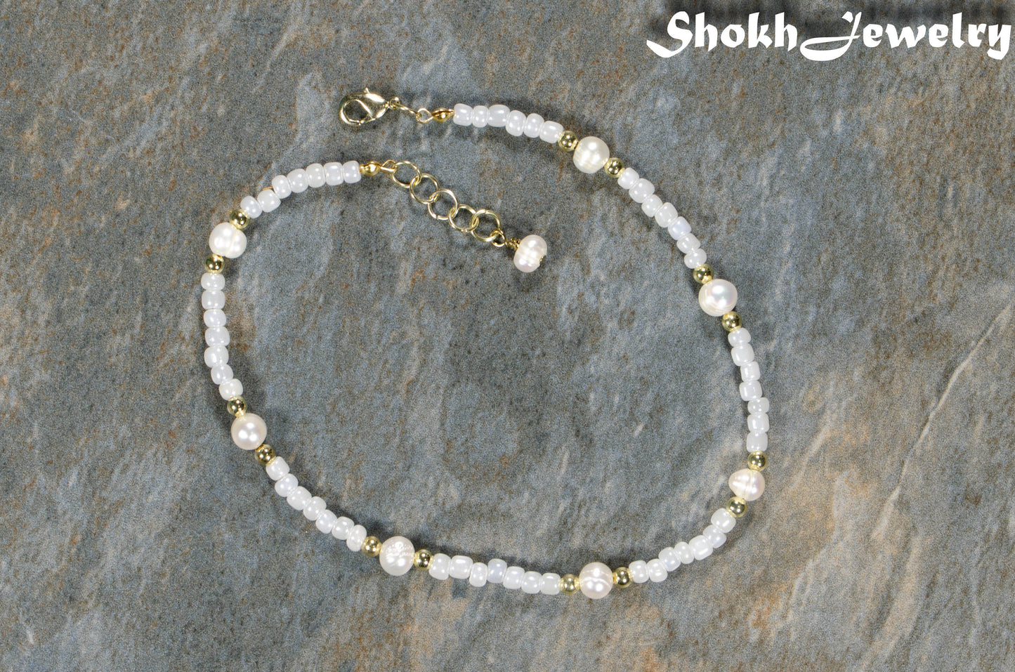 Top view of Freshwater Pearl and White Seed Bead Choker Necklace with Gold Plated Spacers.