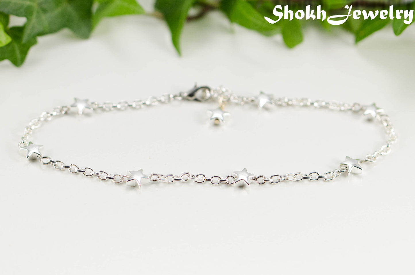 Close up of Hematite Star and Dainty Chain Choker Necklace.