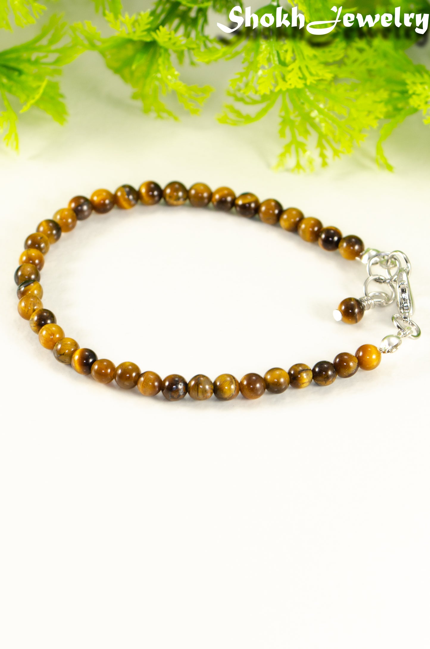 Close up of 4mm Tiger's Eye Stone Bracelet with Clasp.