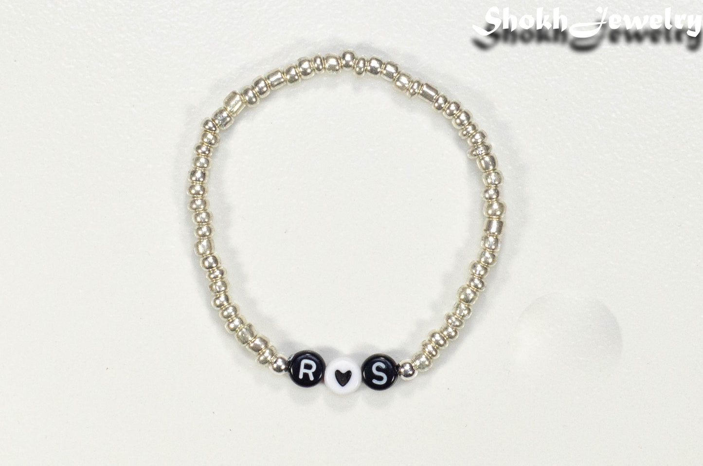 Top view of Silver Seed Beads Bracelet with Initials.