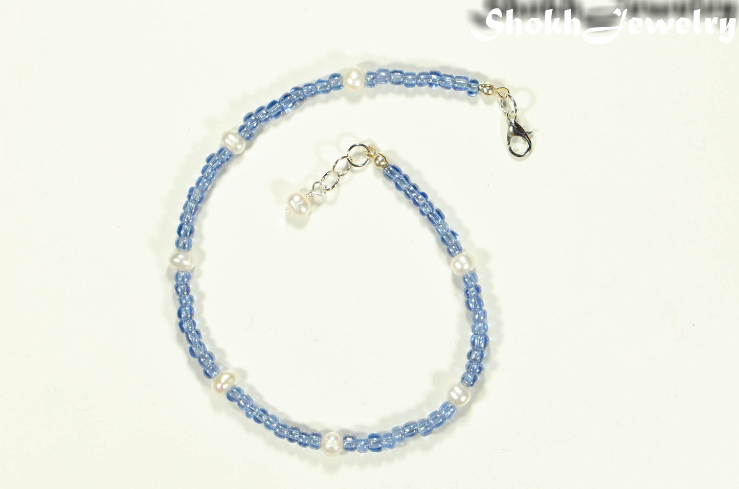 Top view of Freshwater Pearl and Blue Seed Bead Anklet.