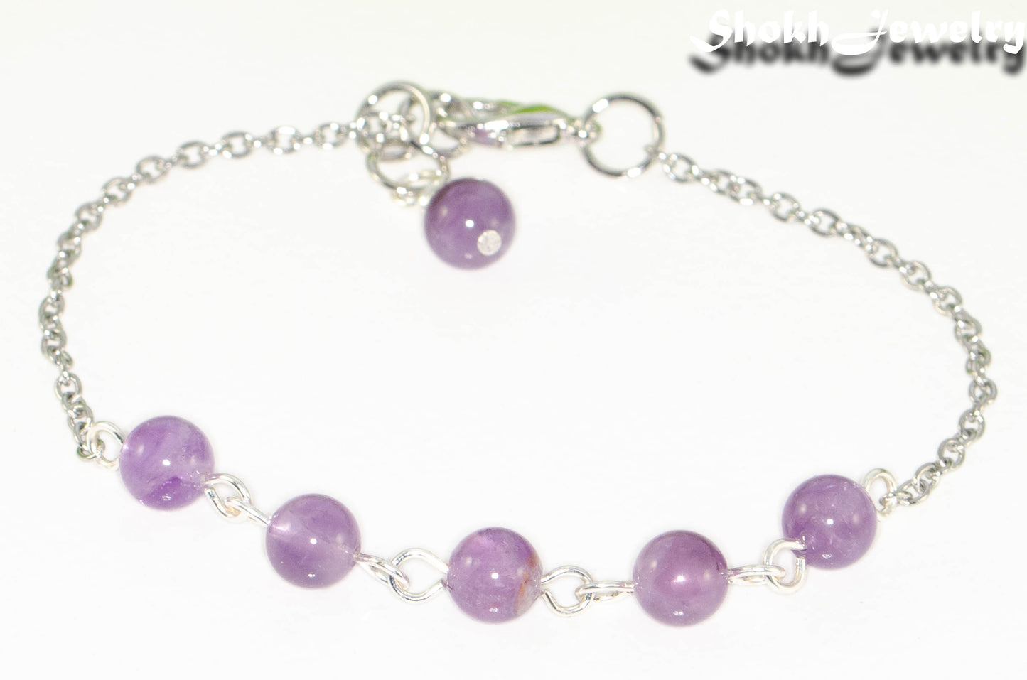 Close up of Amethyst and Stainless Steel Chain Anklet.