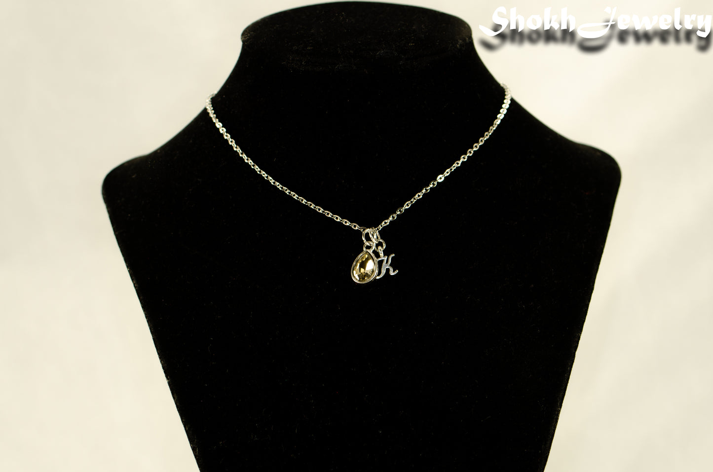 Small Personalized April Birthstone Choker Necklace displayed on a bust.