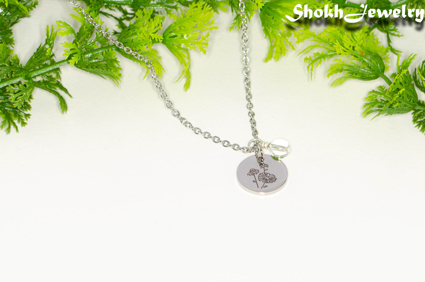 April Birth Flower Necklace with Clear Quartz Birthstone Pendant.
