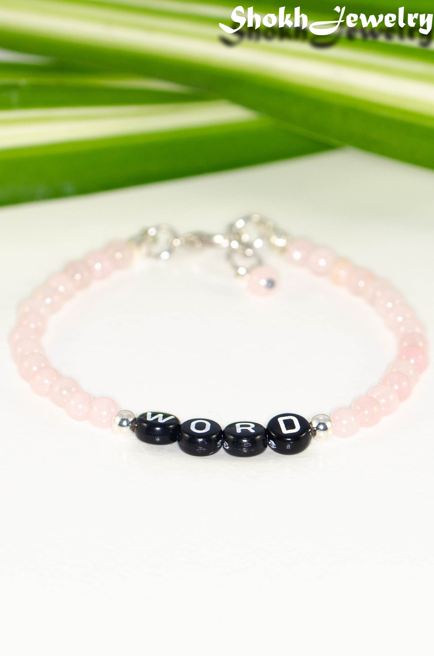 Close up of Personalized Rose Quartz Bracelet with Clasp.