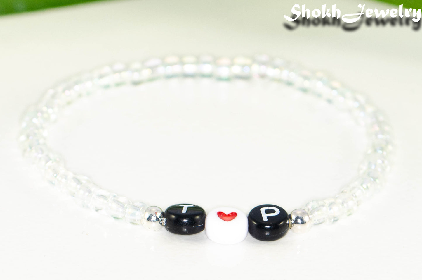 Close up of Clear Seed Beads Bracelet with Initials.