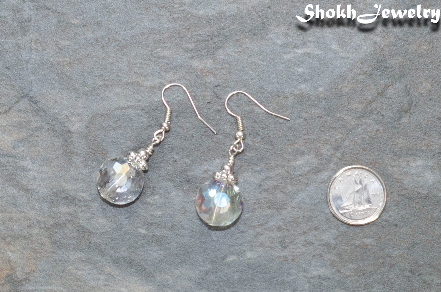 Clear AB Glass Crystal Beads Earrings beside a dime.