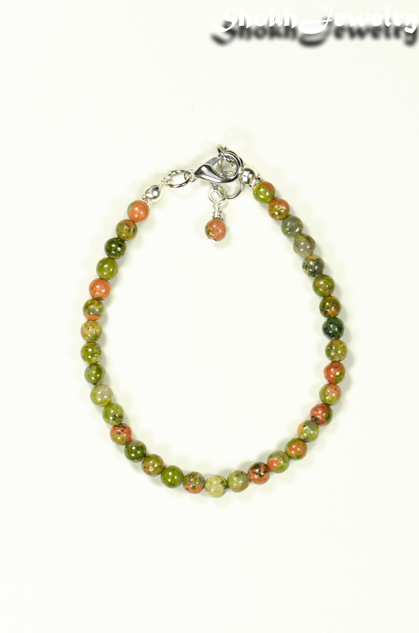 Top view of 4mm Natural Unakite Bracelet with Clasp.