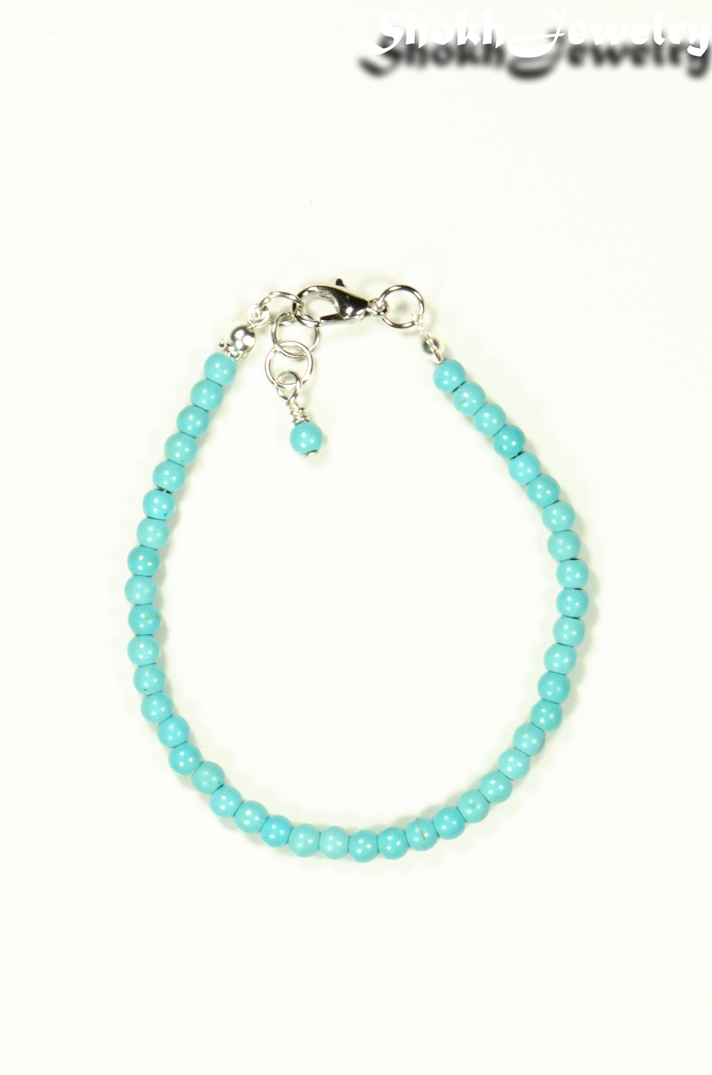 Top view of 4mm Turquoise Howlite Bracelet with Clasp.