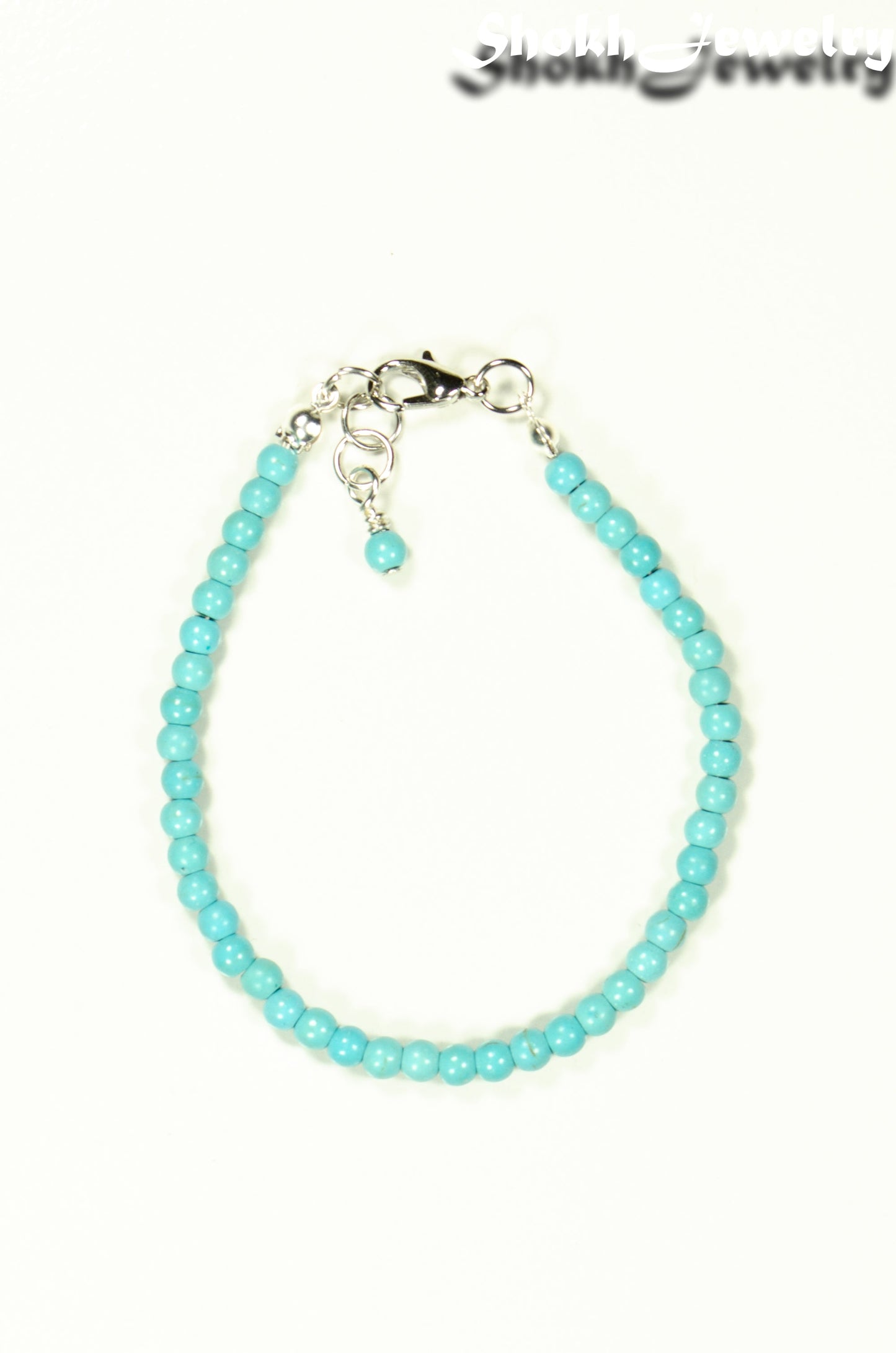Top view of 4mm Turquoise Howlite Anklet with Clasp.