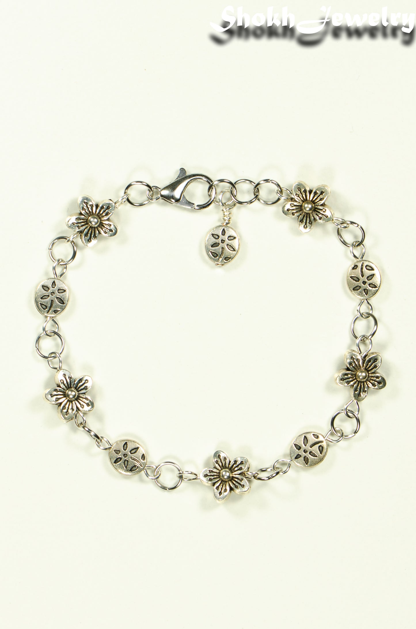 Top view of Tibetan Silver Flower Link Bracelet.