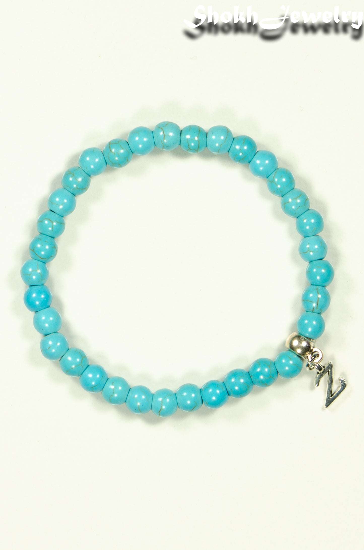 Top view of 6mm Turquoise Howlite Bracelet with Initial.