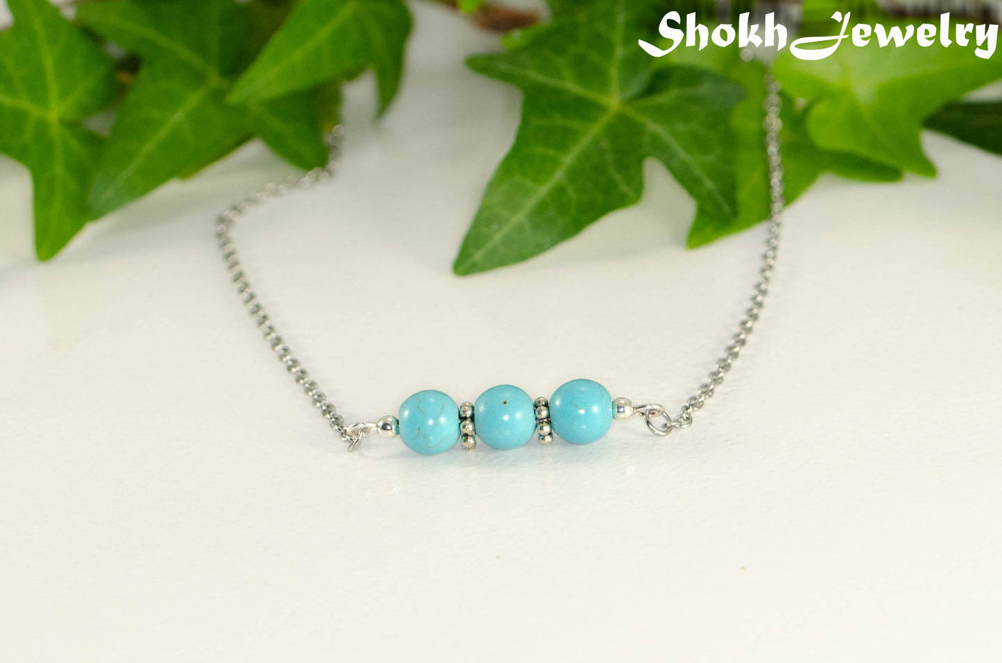 Close up of Turquoise Howlite and Dainty Chain Choker Necklace.