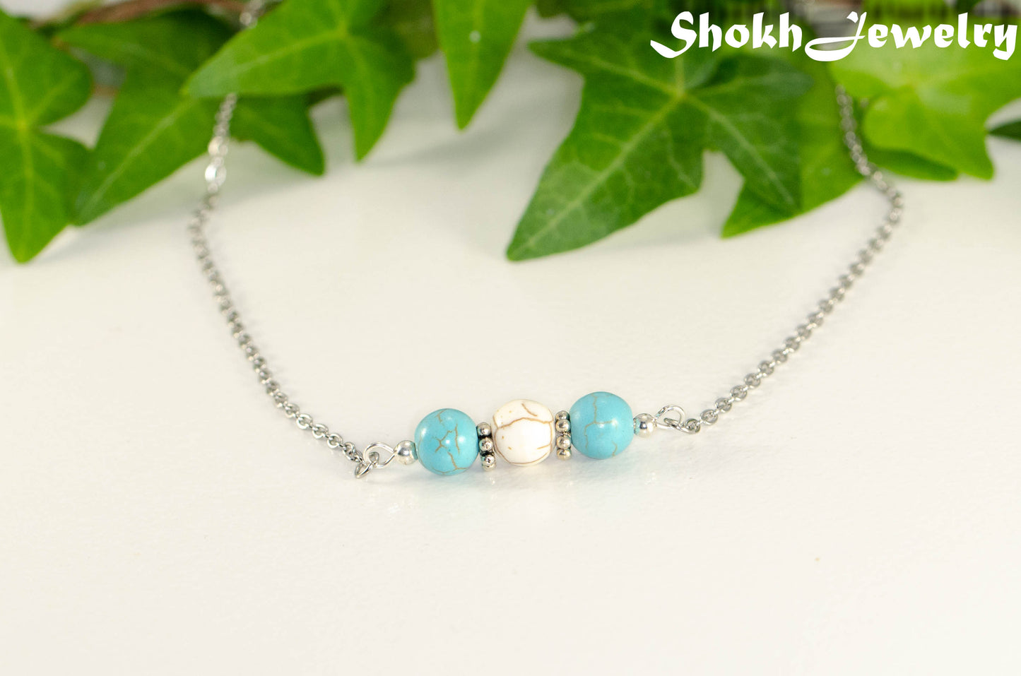 Close up of Turquoise and White Howlite and Dainty Chain Choker Necklace.