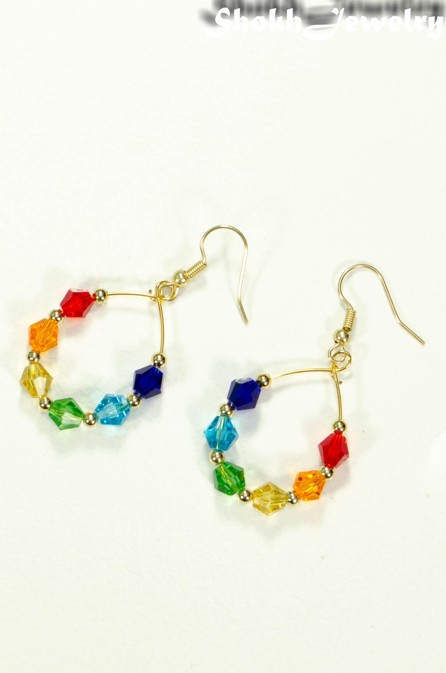 Top view of Rainbow Glass Crystal Hoop Earrings.