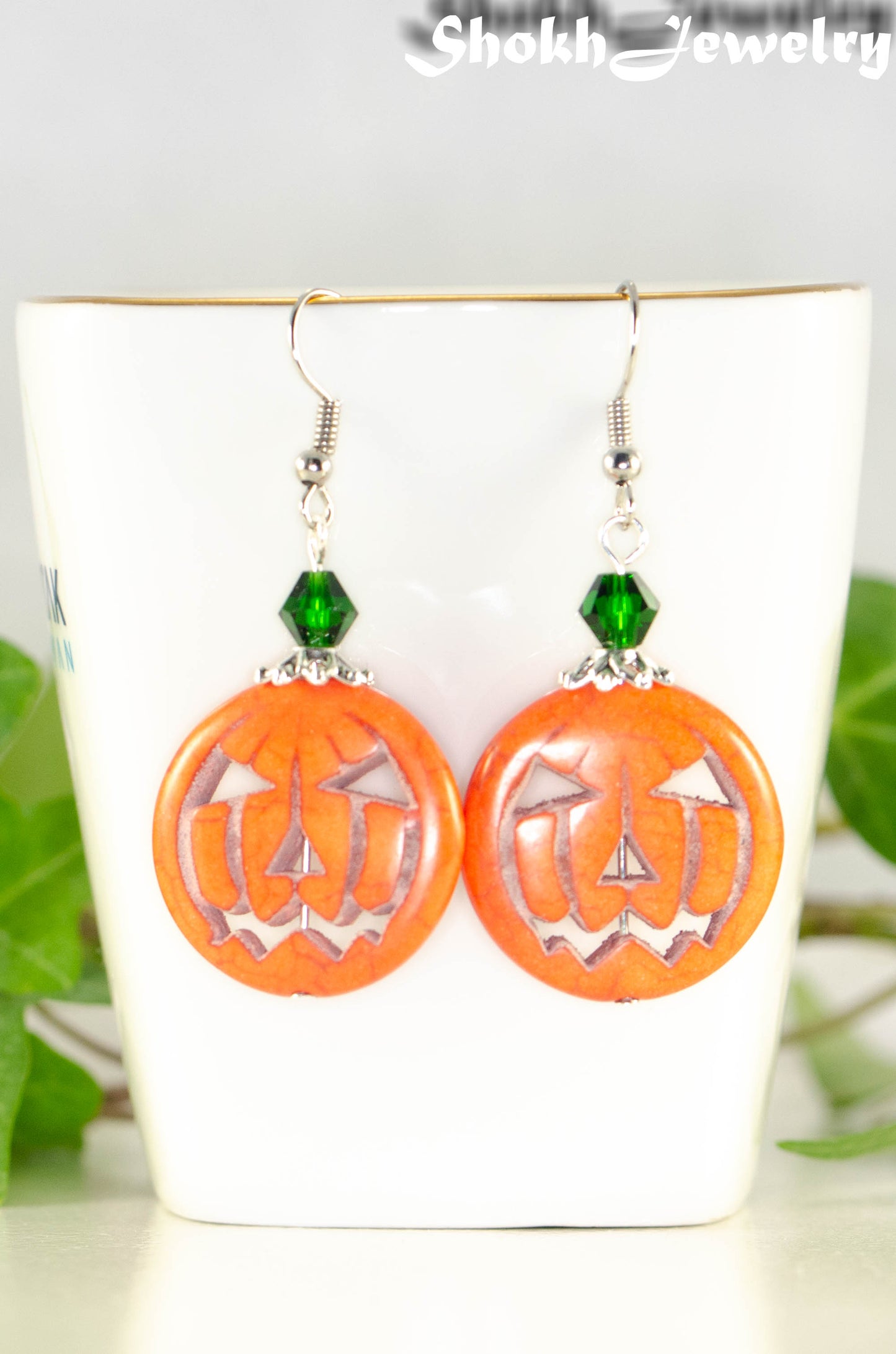 Close up of Spooky Halloween Pumpkin Earrings.