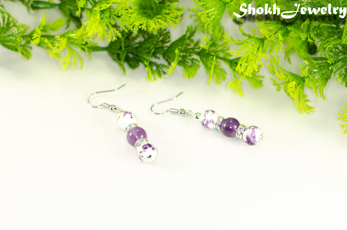 Long Floral Ceramic Bead and Amethyst Earrings.