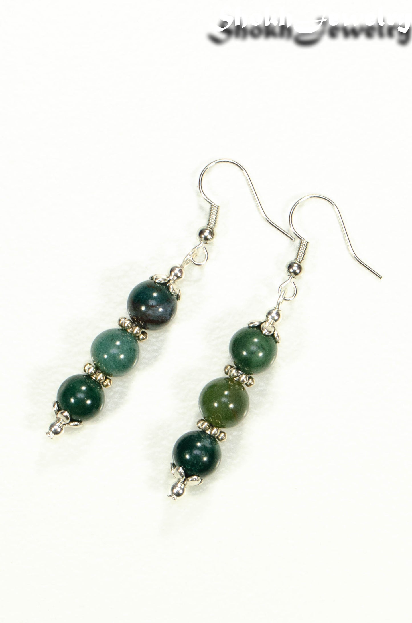 Top view of Natural Moss Agate Beaded Bar Earrings.
