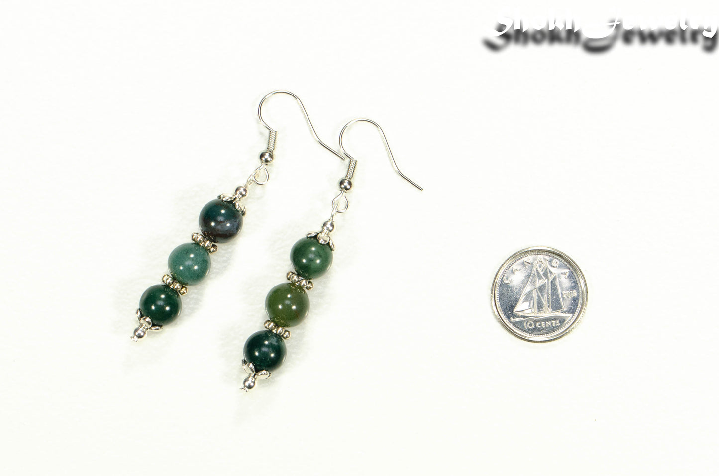 Natural Moss Agate Beaded Bar Earrings beside a dime.